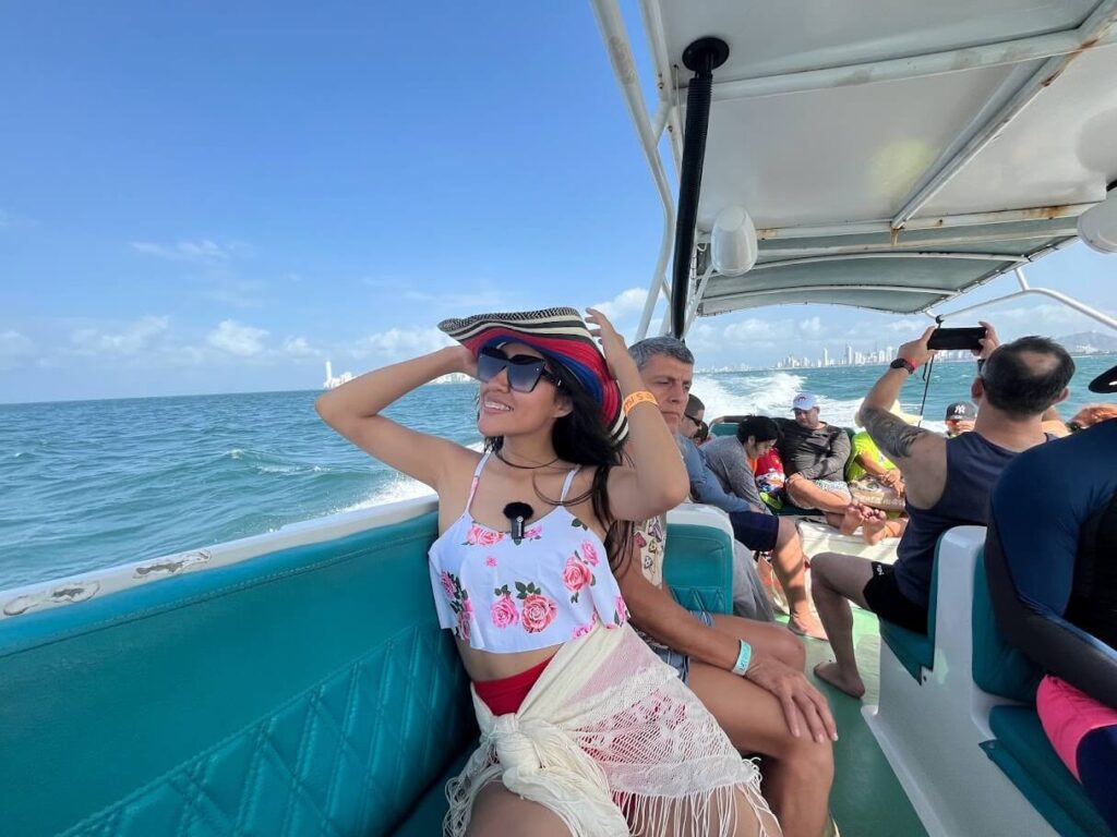 Roxeus enjoying a boat ride with fellow travelers during her island-hopping tour in Rosario Islands, Cartagena