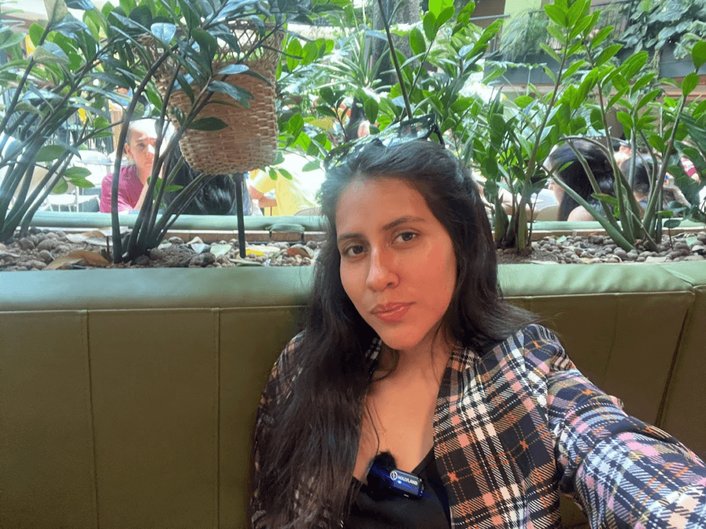 Roxeus at Oviedo Mall in Medellín, Colombia, sitting in a green area inside the mall