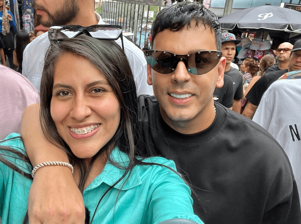 Roxeus smiling with Tito El Bambino at Comuna 13 in Medellin